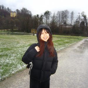 Girl with coat on