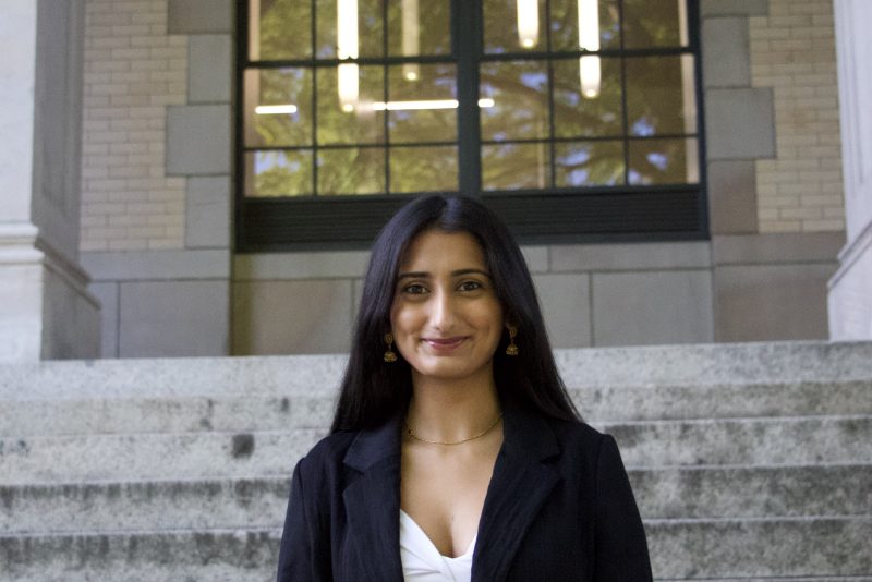 Sejal Antal stands in front of Denny Hall.