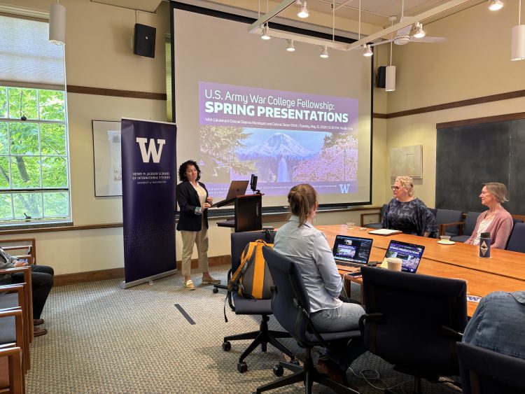 Lieutenant Colonel Deanna Manriquez presents her report, "Critical Thinking and the Army’s Shift to AI Dependence" on May 12, 2026.